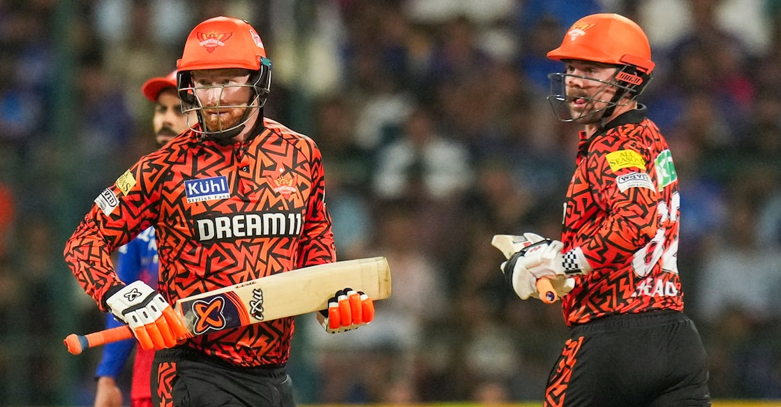 Sunrisers Hyderabad batters Heinrich Klaasen and Travis Head run between the wickets during the Indian Premier League (IPL) match against Royal Challengers Bengaluru at M Chinnaswamy stadium in Bengaluru on Monday. Photo: PTI