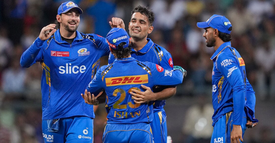Mumbai Indians bowler Anshul Kambhoj with teammates celebrates the wicket of Sunrisers Hydrabad batter Mayank Agarwal during the Indian Premier League match at Wankhede Stadium in Mumbai on Monday. Photo: PTI