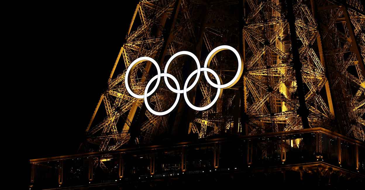 OLYMPICS-2024/ A general view of the Olympic rings on the Eiffel Tower a day before the opening ceremony of the Paris 2024 Olympics, in Paris, France June 25, 2024. Photo: Reuters/Agustin Marcarian