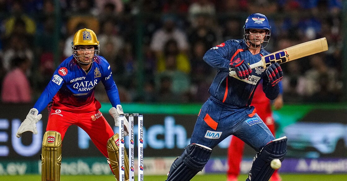 Lucknow Super Giants' Quinton de Kock plays a shot during the Indian Premier League (IPL) 2024 match against Royal Challengers Bengaluru at M Chinnaswamy Stadium in Bengaluru on Tuesday. Photo: PTI