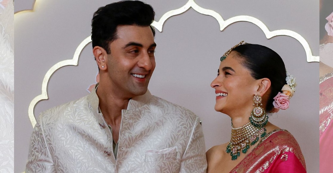 Actors Ranbir Kapoor and Alia Bhatt pose for pictures on the red carpet on the day of the wedding of Anant Ambani and Radhika Merchant in Mumbai, India, July 12, 2024. Photo: Reuters/Francis Mascarenhas