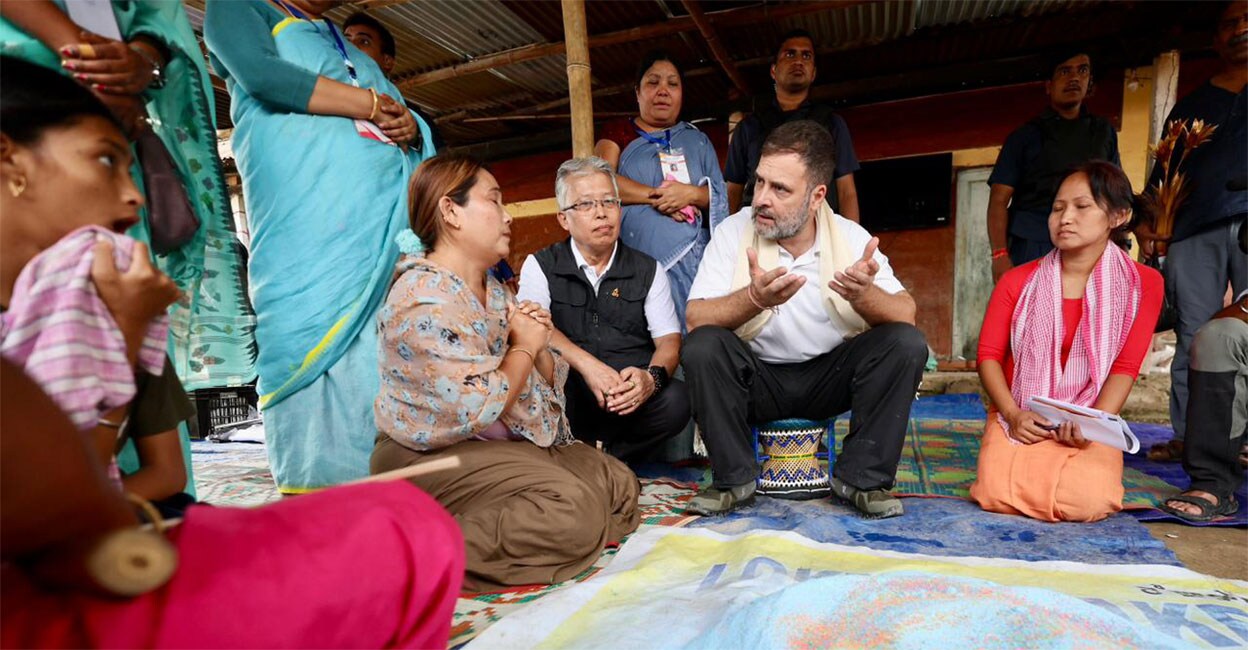 relief-camp-manipur-rahul-gandhi-visit Rahul Gandhi interacts with people in a relief camp at Moirang, Manipur on Monday. Photo: PTI