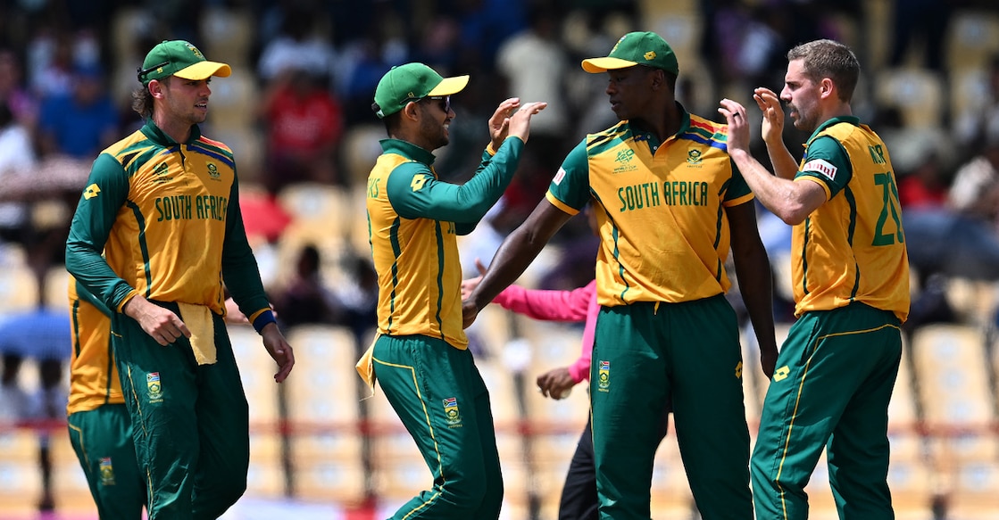 Players of South Africa celebrate after winning the T20 World Cup 2024 Super Eight match against England at Daren Sammy National Cricket Stadium in Gros Islet, Saint Lucia, on June 21, 2024. Photo: AFP/ Chandan Khanna 