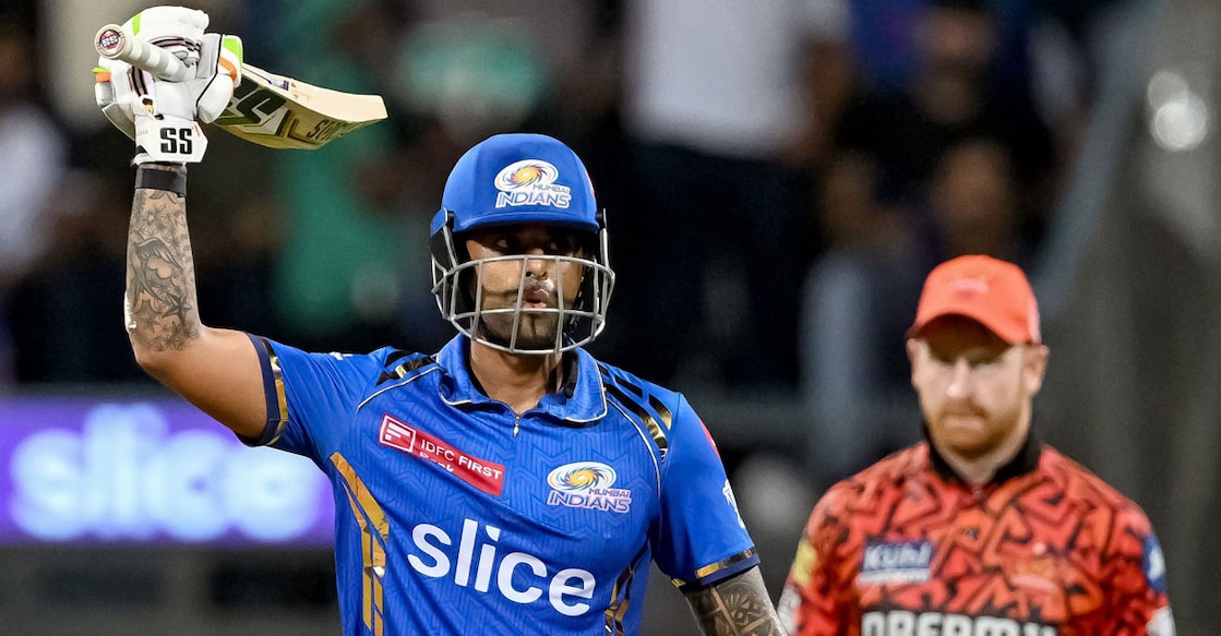 Mumbai Indians' Suryakumar Yadav (left) celebrates after scoring a half-century during the Indian Premier League (IPL) match against Sunrisers Hyderabad at the Wankhede Stadium in Mumbai on Monday. Photo: AFP/Punit Paranjpe