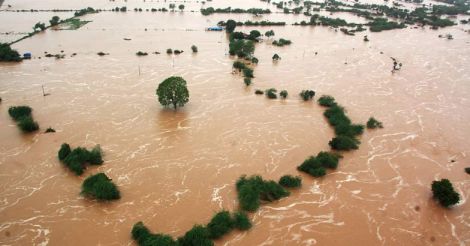 Banaskantha: An aerial view of flood hit Banaskantha district of Gujarat on July 25, 2017. (Photo: IANS), Gujarat floods: 14 of a family found dead, toll rises to 123