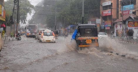 With an eye on the sky, rain-hit Kerala limps back to normalcy