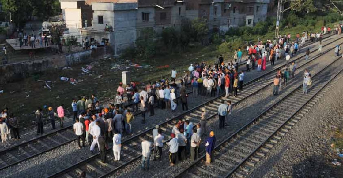 Amritsar train tragedy: A father's ordeal searching for his son's decapitated body Amritsar train tragedy: A father's ordeal searching for his son's decapitated body