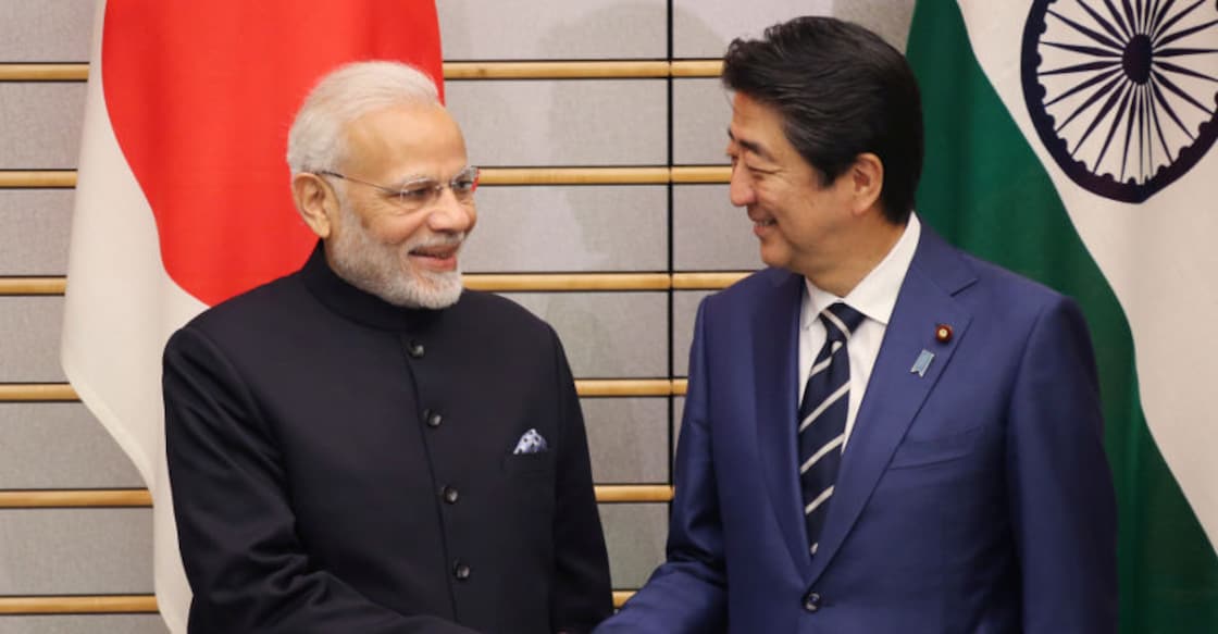 modi-abe-tokyo Narendra Modi and Shinzo Abe shake hands prior to their meeting at Abe's official residence,Tokyo. Reuters