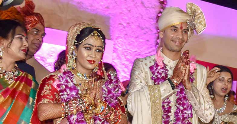PTI5_12_2018_000193B RJD chief Lalu Prasad's elder son Tej Pratap and Aishwarya Rai during their wedding ceremony . PTI