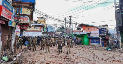 Army hold flag march in restive Shillong; cop injured in clash