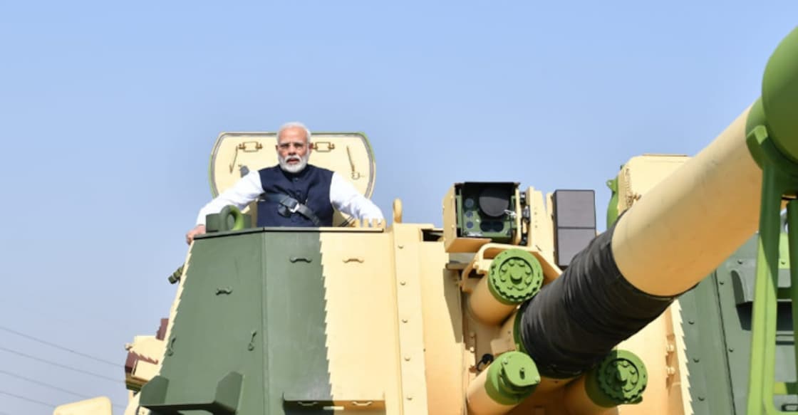 Modi boards tank at L&T's gun-making facility in Gujarat