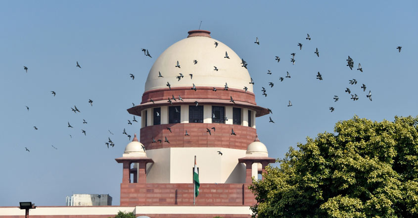 COVID-19 guidelines on face masks & social distancing violated with impunity: SC