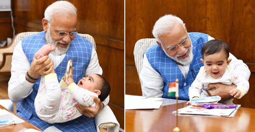 Who is the baby in Modi's Instagram post?