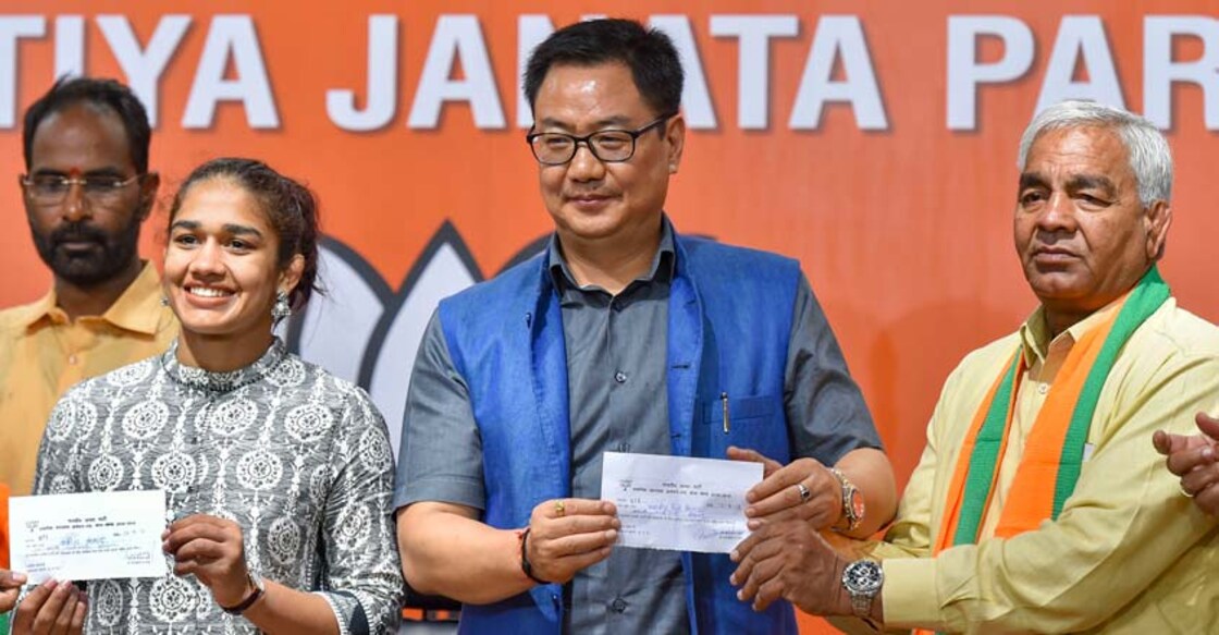 Babita Phogat, Mahavir Phogat join BJP ahead of Haryana polls Babita Phogat, Mahavir Phogat join BJP ahead of Haryana polls