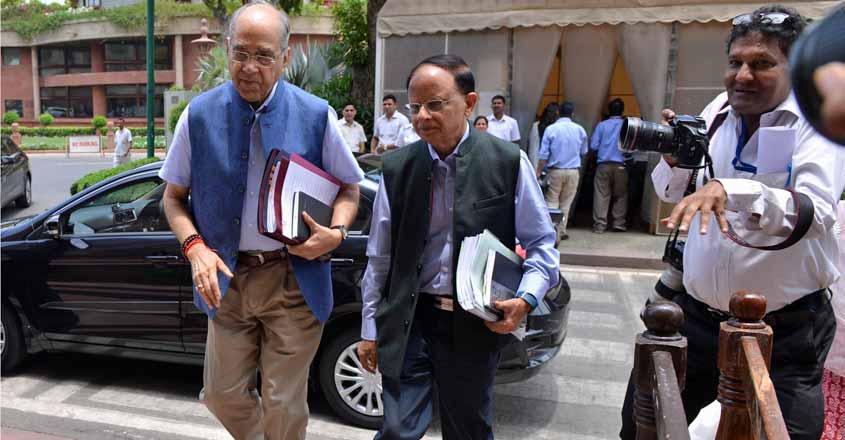 New Delhi: Principal Secretary to the Prime Minister, Nripendra Misra and Additional Principal Secretary to the Prime Minister, Pramod Kumar Misra arrive at Parliament, in New Delhi on July 3, 2019. (Photo: IANS)
