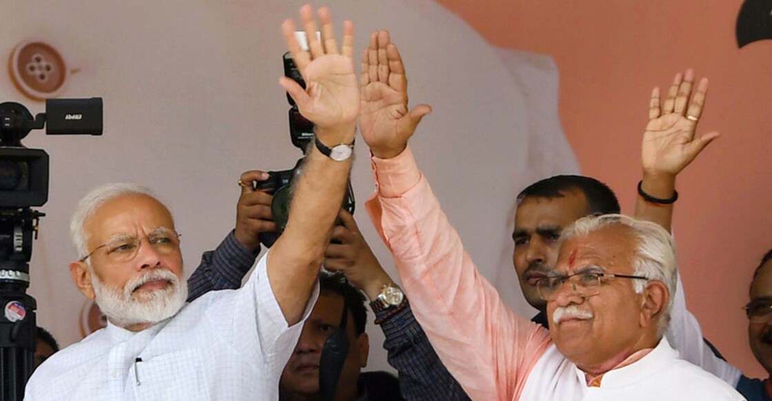 Modi presents govt's 100-day report in poll-bound Haryana Modi presents govt's 100-day report in poll-bound Haryana