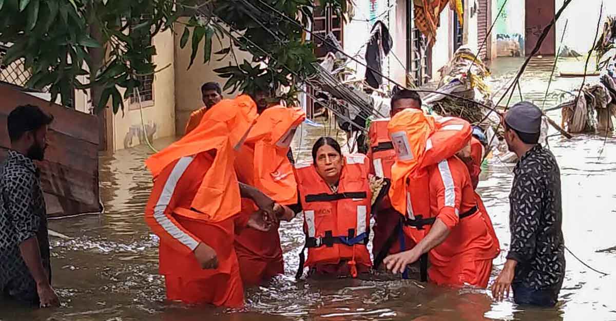 NDRF personnel carrying out rescue operations NDRF personnel carrying out rescue operations