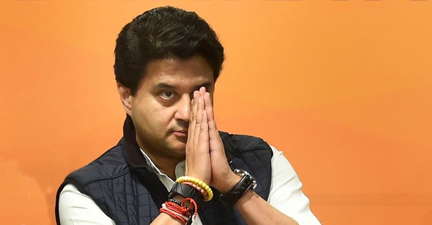 Scindia offered RS seat, but he wanted Digvijaya out of fray: Congress Former Congress leader Jyotiraditya Scindia greets as he arrives to join BJP at party headquarters in New Delhi on Wednesday. PTI