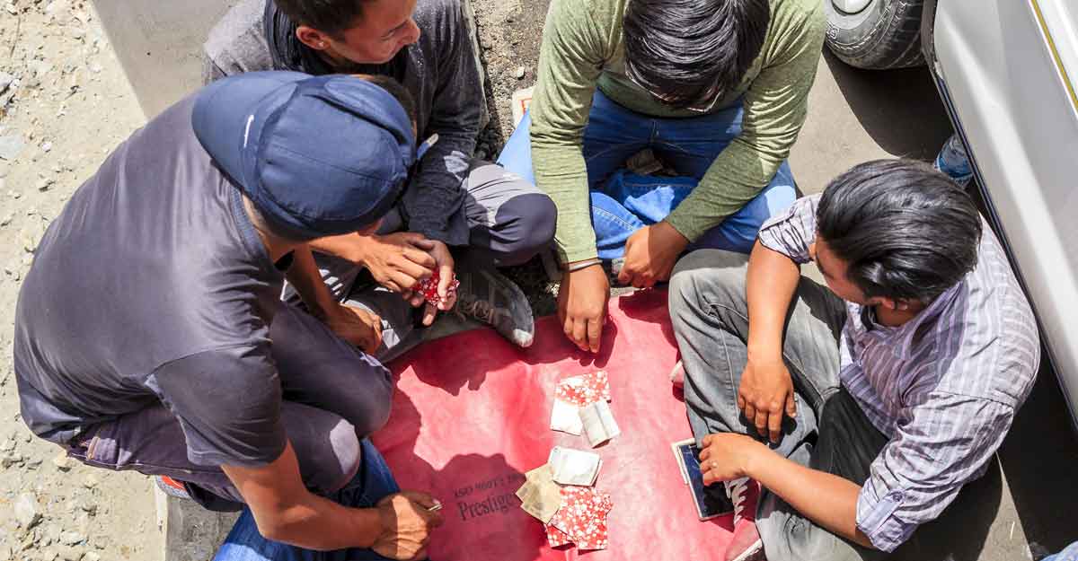 'Bored' truck driver plays cards with friends, 24 test coronavirus positive | Shutterstock