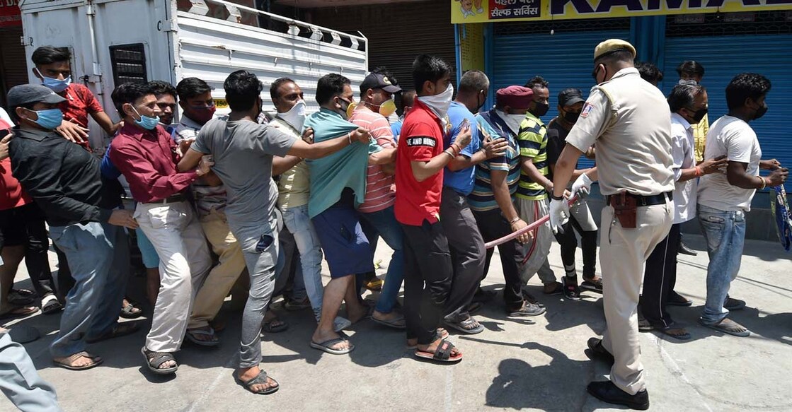 States get a high as curbs ease: Booze sales trickle into empty coffers 