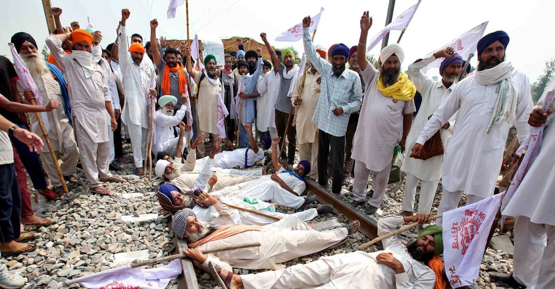 Farmers block roads, railways as protests mount over farm bills