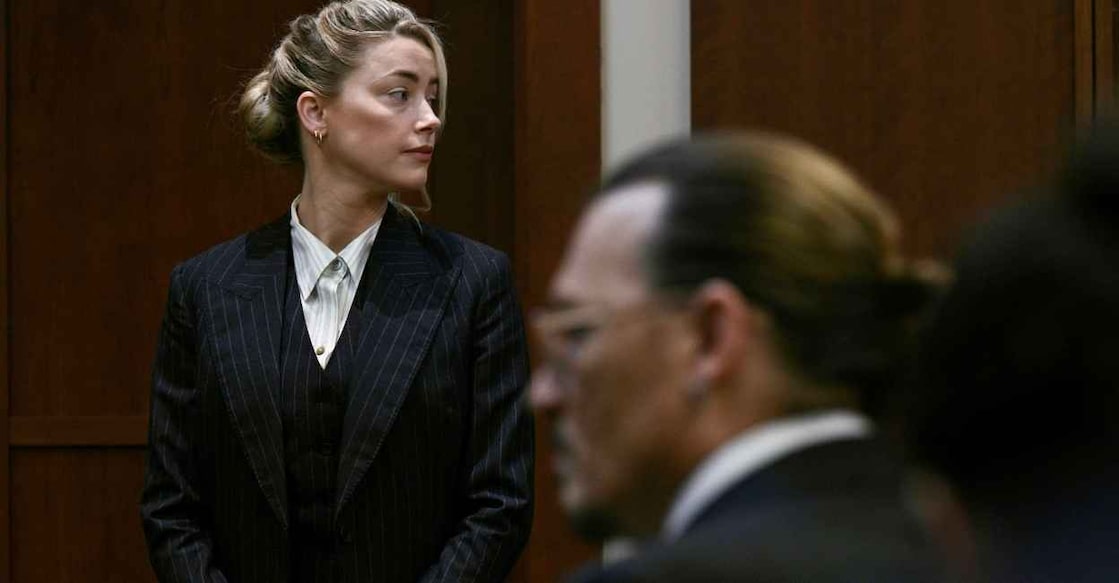 jhonny-depp-amber-heard-trial Actors Amber Heard and Johnny Depp wait at the courtroom at the Fairfax County Circuit Courthouse in Fairfax, Virginia, U.S., May 17, 2022. Brendan Smialowski/Pool via REUTERS