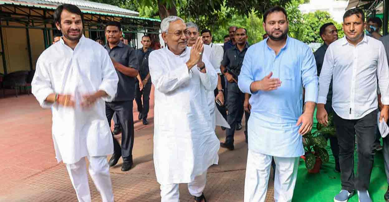 Janata Dal (United) leader Nitish Kumar with Rashtriya Janata Dal leaders Tejashwi Yadav and Tej Pratap, in Patna, Tuesday, Aug. 9, 2022. Photo: PTI