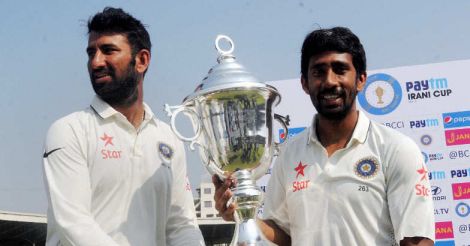 Pujara, left, and Saha