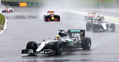 Lewis Hamilton win takes F1 title battle down to last race