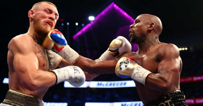 Conor McGregor taunts Floyd Mayweather over domestic abuse