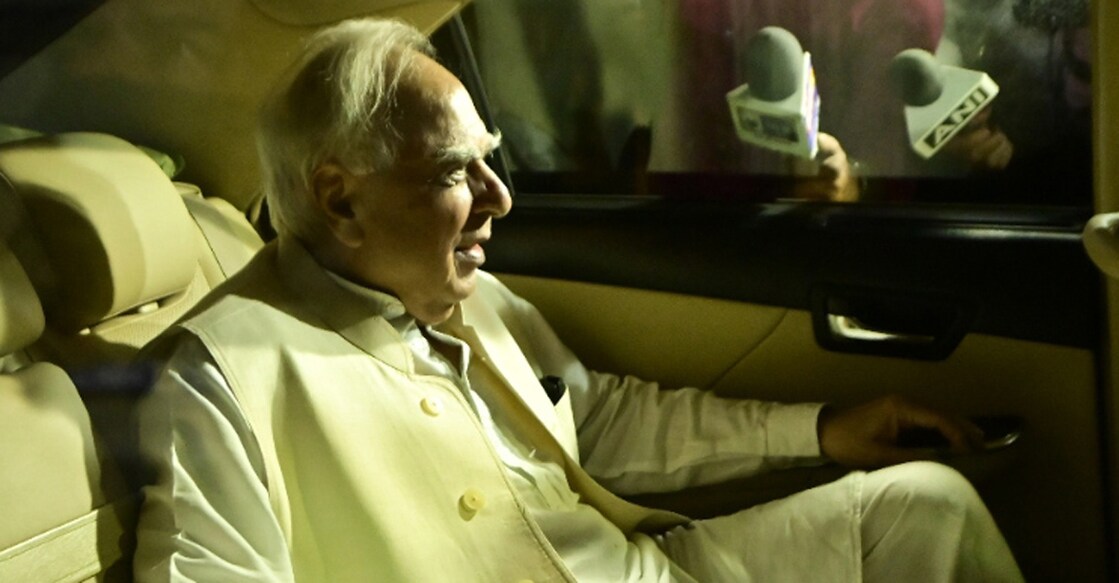 Congress leader Kapil Sibal leaves from the residence of party leader Ghulam Nabi Azad, after the Congress G-23 leaders' meeting in New Delhi, March 16, 2022. Photo: PTI/Ravi Choudhary