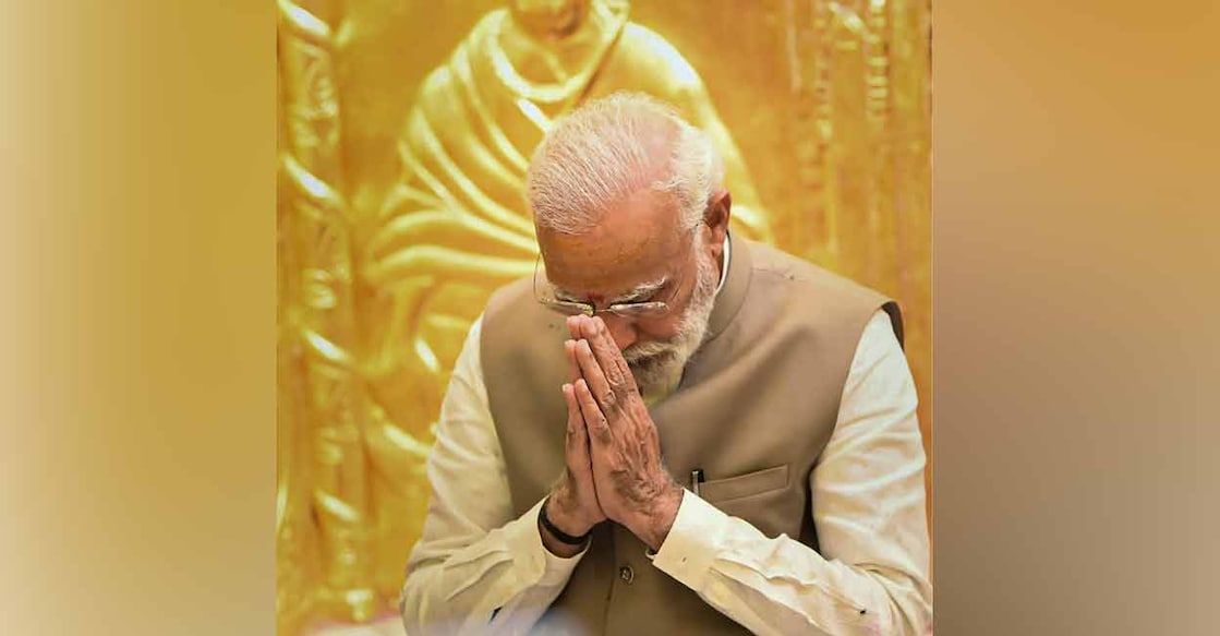 Modi in Kashi Prime Minister Narendra Modi visits Kashi Viswanath Dham Temple, during a roadshow for UP polls, in Varanasi district. (PTI Photo)