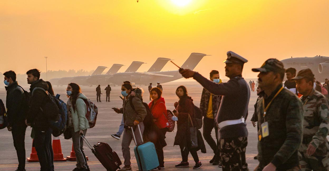 Indian nationals, evacuated from crisis-hit Ukraine, upon their arrival at the Hindon Air Force Station in Ghaziabad, early Thursday, March 3, 2022. Photo: PTI