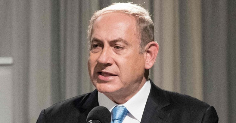 Benjamin Netanyahu Israeli Prime Minister Benjamin Netanyahu delivers a speech before lighting the candles during the start of the Jewish light festival of Hanukkah in Rhavat Ronit, south of Netanya on December 24, 2016. AFP photo