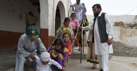 Sardar Haji Jan Mohammad Khilji with kids