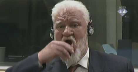 Bosnian-Croat war crimes convict dies after taking 'poison' in court: reports