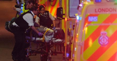London attackers plough van into crowd and stab revelers, kill seven