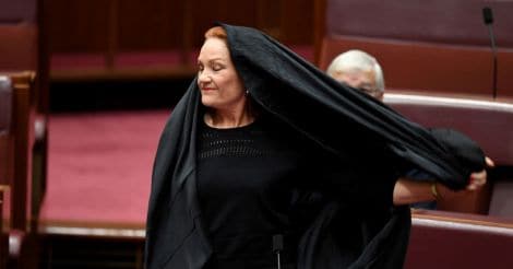 Australian far-right senator wears burqa to parliament in bid to ban them