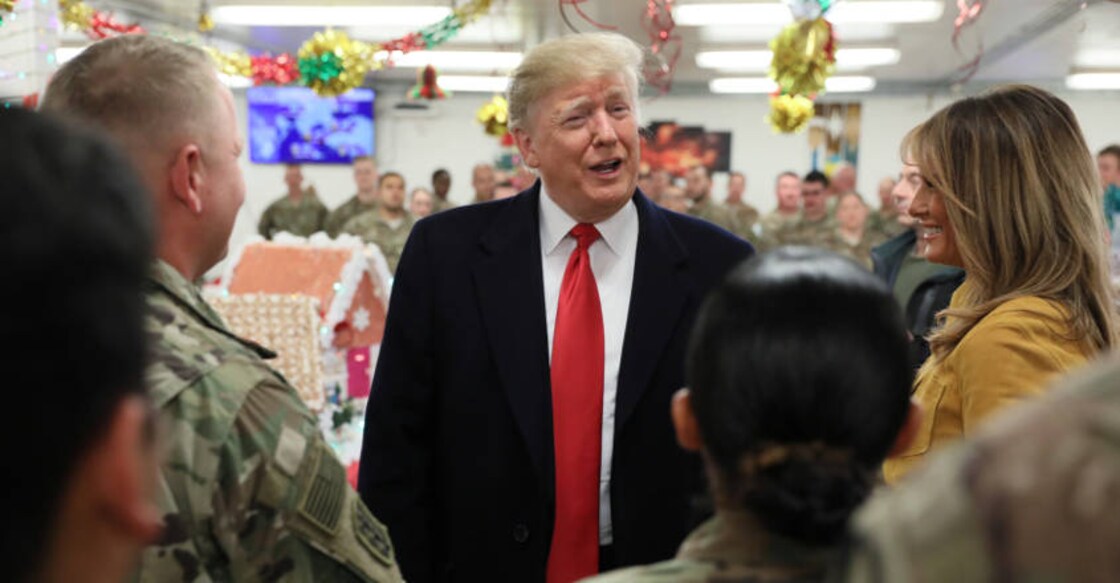 Trump defends Syria pullout during surprise visit to Iraq