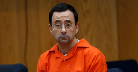 Father of molested girls lunges at disgraced USA Gymnastics doctor in court