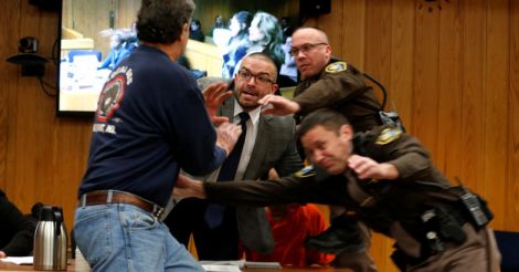 Father of molested girls lunges at disgraced USA Gymnastics doctor in court