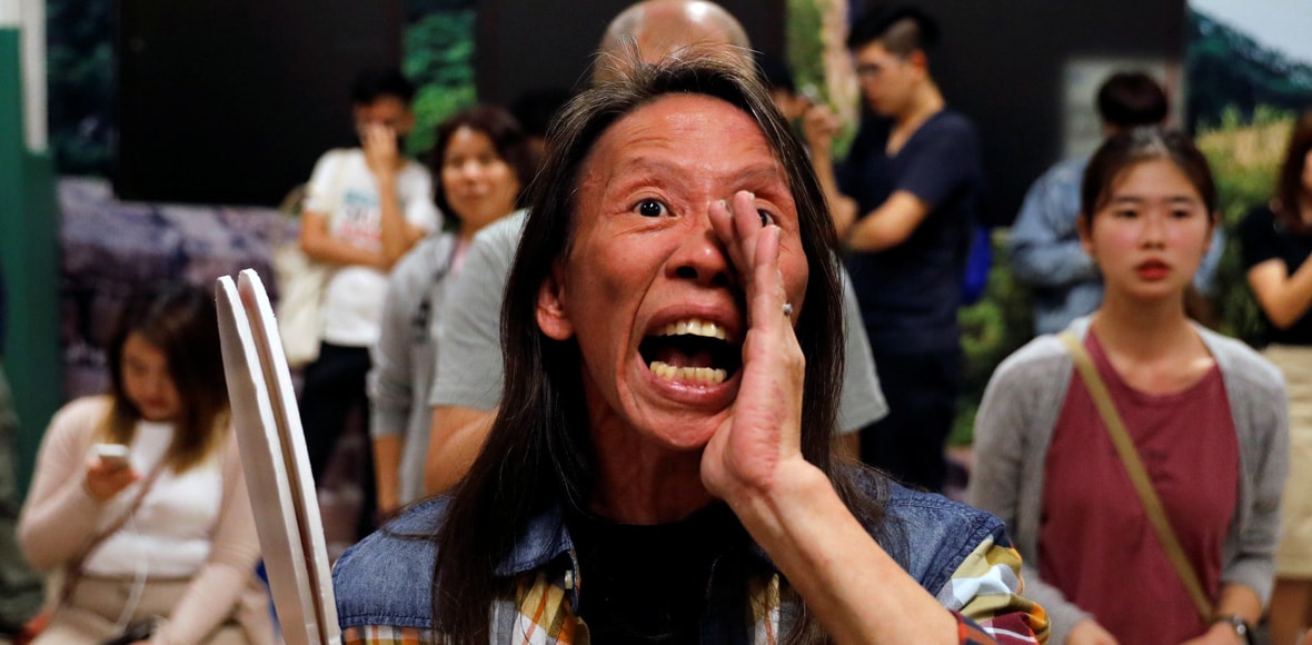 Landslide democratic win in Hong Kong election raises pressure on city's leader Landslide democratic win in Hong Kong election raises pressure on city's leader