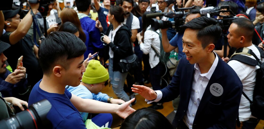 Landslide democratic win in Hong Kong election raises pressure on city's leader