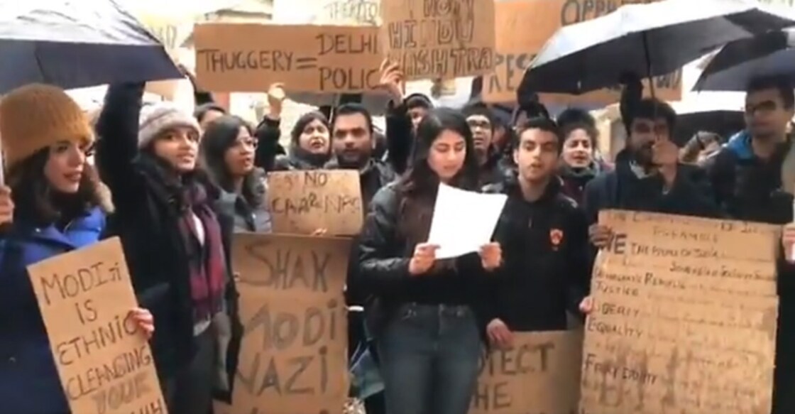 Students of Oxford university in United Kingdom reading the Preamble of the Indian constitution
