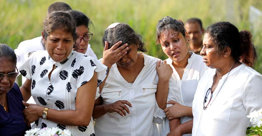 Lankan defence secretary, police chief asked to quit in blast aftermath The injured mother of Sajuni, 23, who died during a string of suicide bomb attacks on churches and luxury hotels on Easter Sunday, mourns at her funeral in Negombo, Sri Lanka, Wednesday. Photo: REUTERS/Athit Perawongmetha