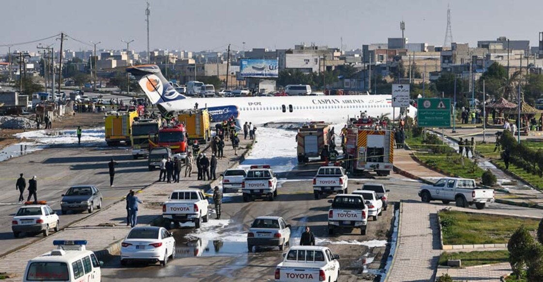 Aging Iran airliner carrying 144 crash-lands on highway