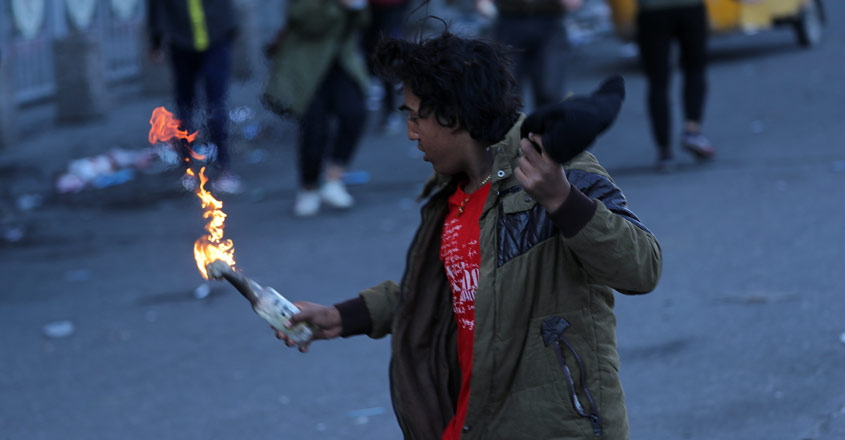 Iraqi security forces kill protester, rockets hit US embassy
