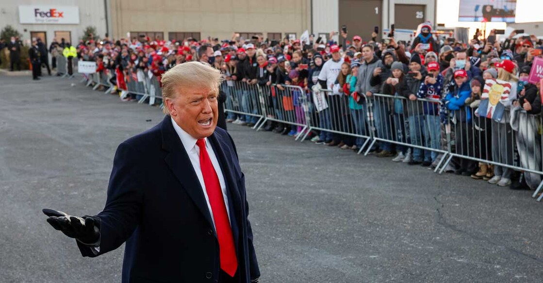 Early US voting surges to new record as Trump, Biden make late push