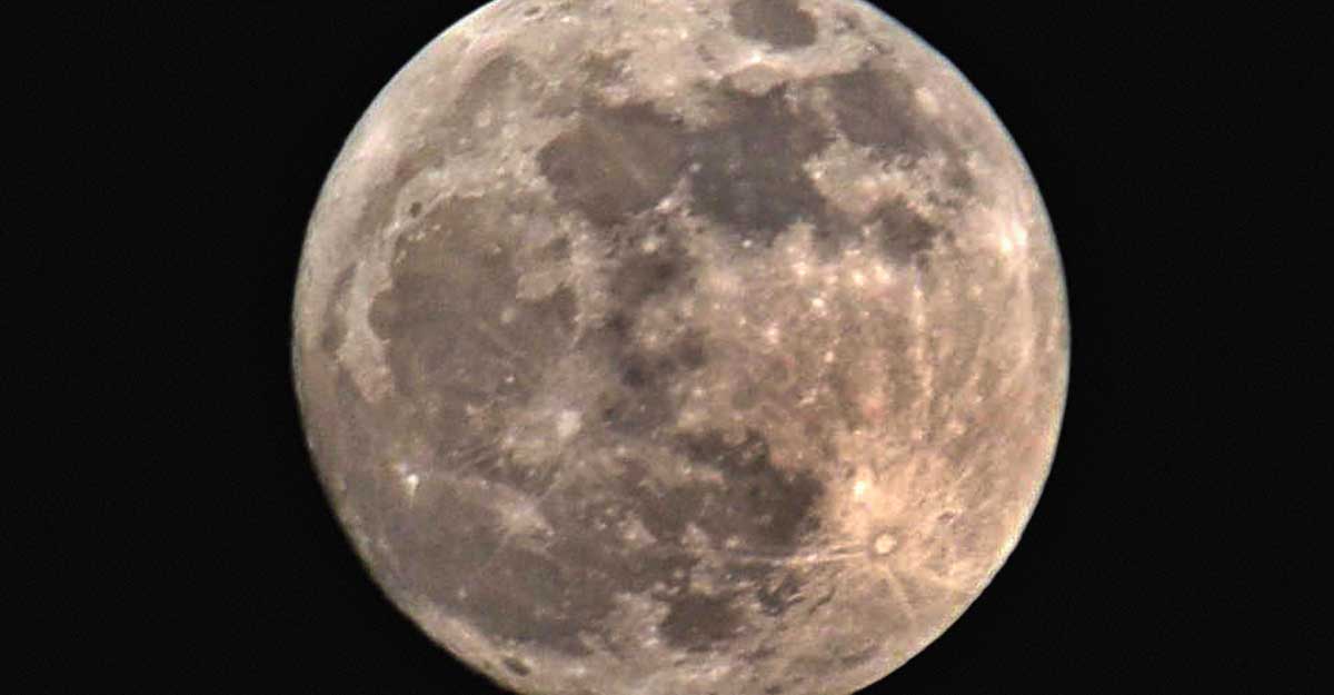 A view of the moon in the sky as seen on the eve of Kartik Purnima, in Patna, Sunday, Nov. 29, 2020. (PTI Photo)