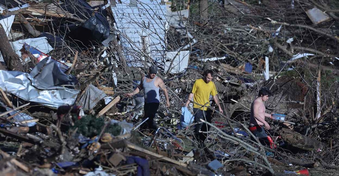 Over 30 tornadoes rip through 6 US states, Kentucky death toll could cross 100 Residents continue to salvage belongings from destroyed homes after a tornado tore through a large section of the city late Friday evening on December 12, 2021 in Mayfield, Kentucky. Photo: Scott Olson/Getty Images/AFP